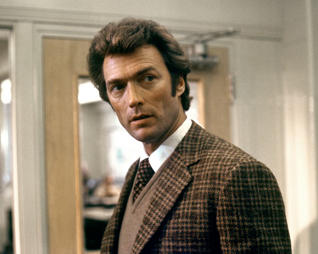 American actor and director Clint Eastwood as Inspector Harry Callahan of the San Francisco Police Department in the 1971 action film 'Dirty Harry.' (Photo by Silver Screen Collection/Getty Images)
