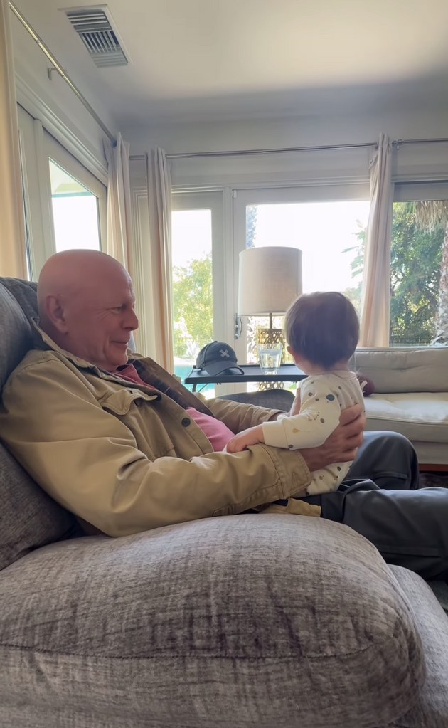 A photo of Bruce Willis with his granddaughter Louetta Isley is shared by Rumer Willis on Instagram in a video montage in honor of Mother's Day 2024