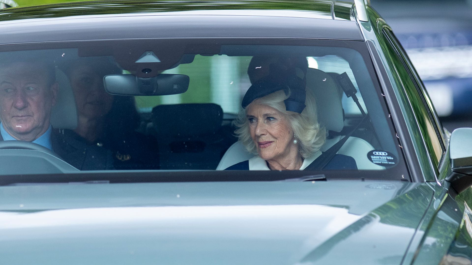 Queen Camilla and the driver in a car