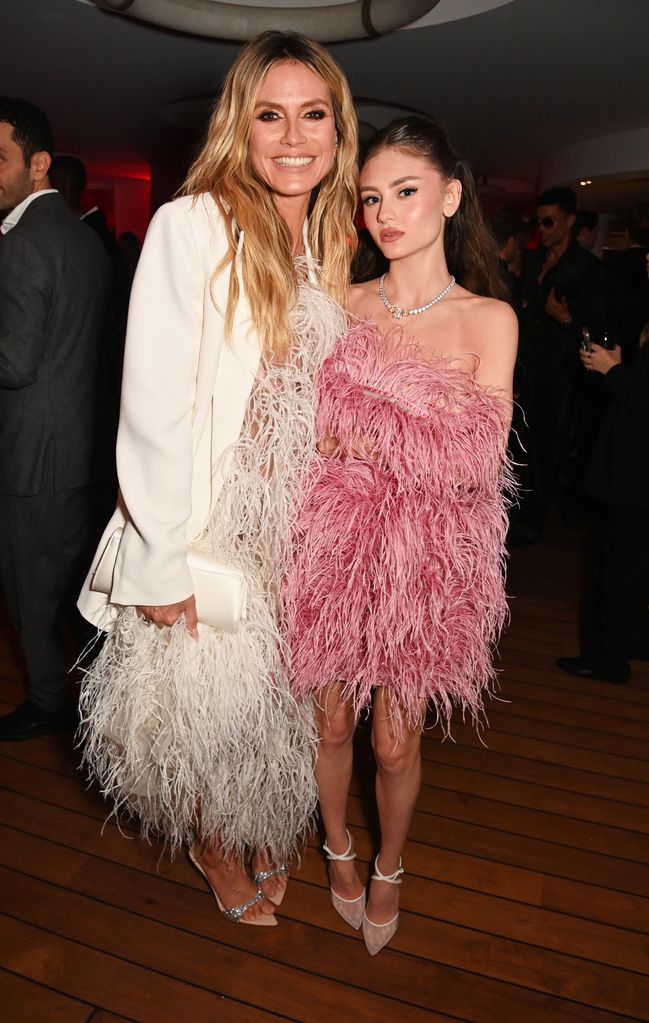 Heidi Klum and Leni in feathered dresses