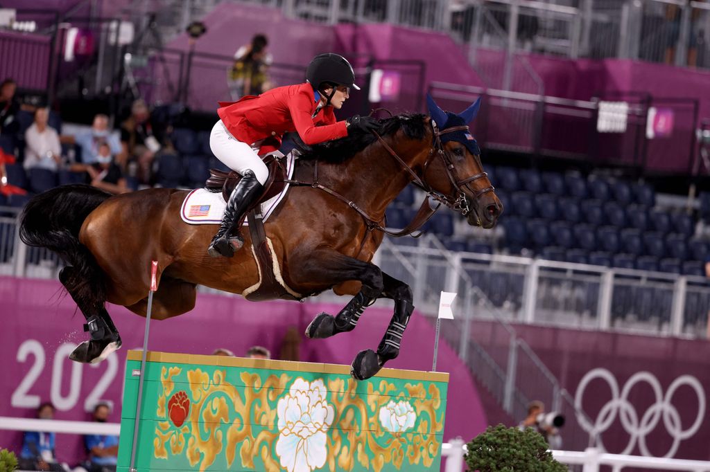 Jessica Springsteen of the United States riding Don Juan van de Doncove while Indiana rides in the equestrian jumping team between Sweden and the United States during the Tokyo 2020 Olympic Games at Equestrian Park in Tokyo on August 7, 2021.  (Photo by BEHROZ MEHRI/AFP) (Photo by BEHROZ MEHRI/AFP via Getty Images)