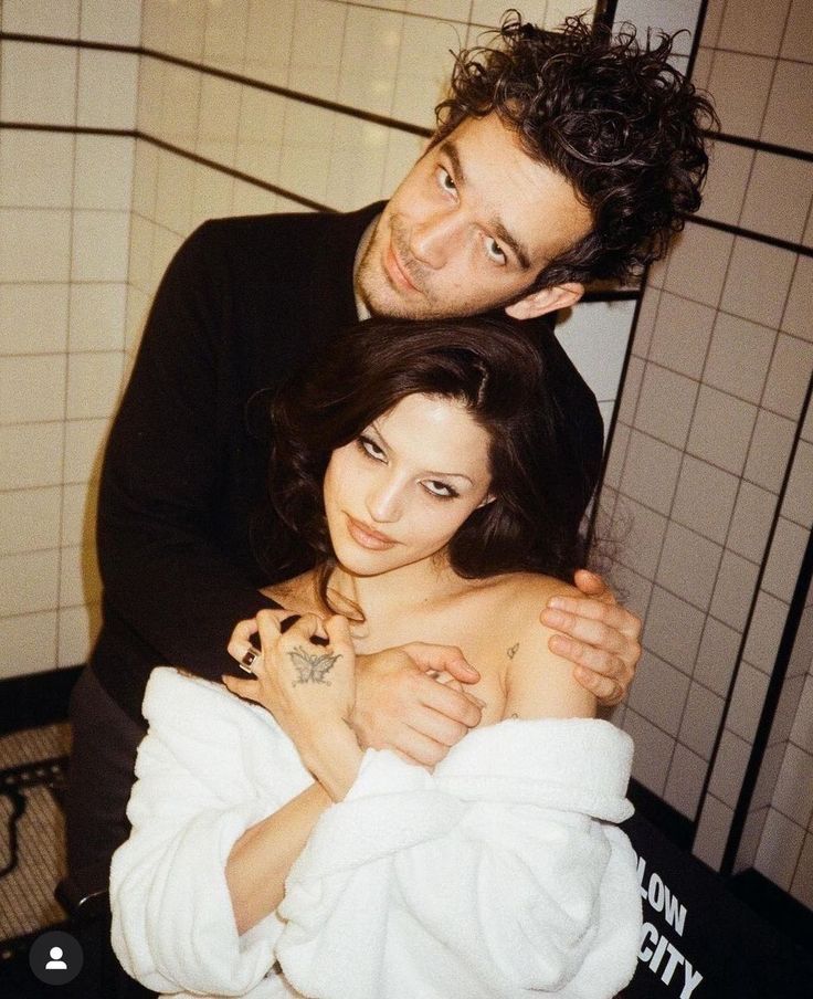 Matty and Gabrielle posing in the bathroom