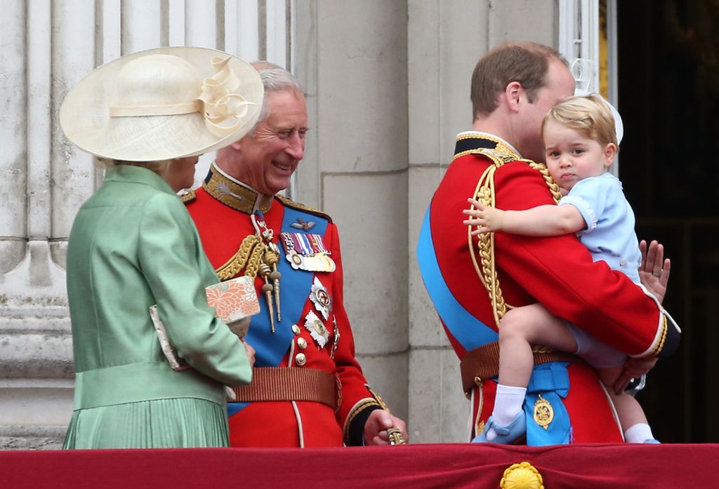 Camilla and Charles look on as Prince George stands on the balcony of Buckingham Palace during the annual Trooping the Colour ceremony at Horse Guards Parade in 2015