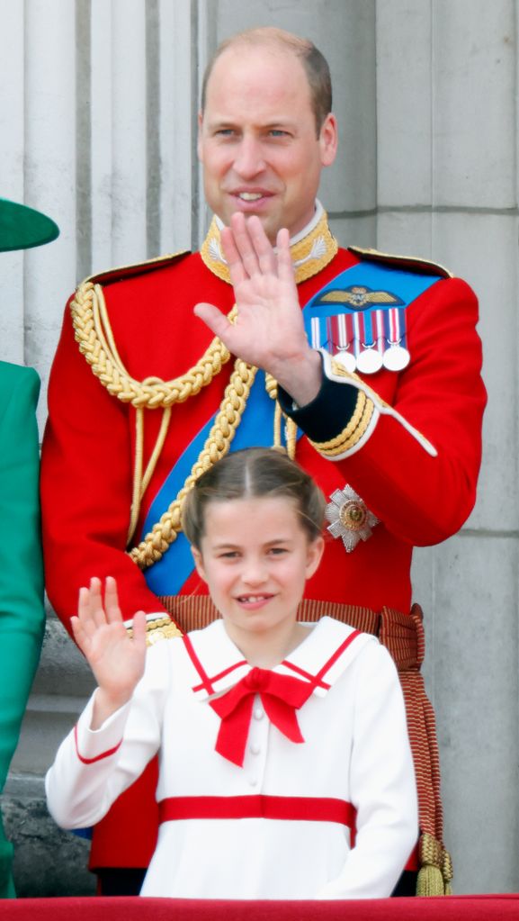 Princess Charlotte and Prince William shaking hands in 2023