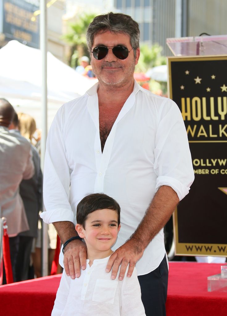 Simon Cowell and Eric Cowell attend the ceremony to honor Simon Cowell with a star on the Hollywood Walk of Fame held on August 22, 2018 in Hollywood, California.