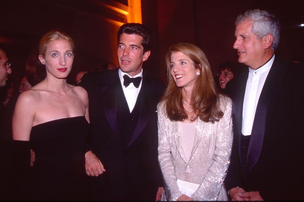 Carolyn Bessette-Kennedy (1966 - 1999) and John F. Kennedy Jr. (1960 - 1999) with Caroline Kennedy-Schlossberg and designer Edwin Schlossberg, attending a Municipal Art Society event (in honor of Jacqueline Kennedy Onassis) at Grand Central Station in New York, October 4, 1998