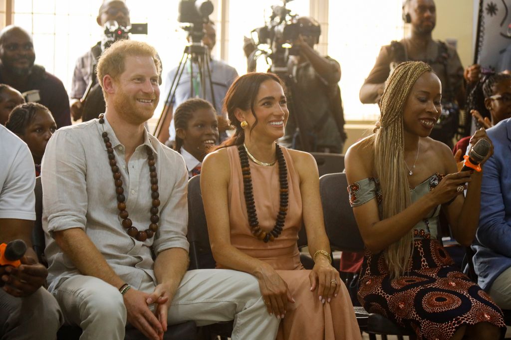Prince Harry and Meghan Markle wear traditional Nigerian necklaces