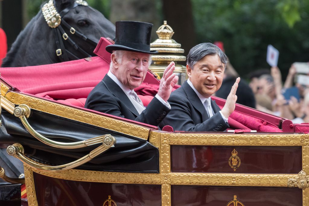 King Charles and Emperor Naruhito travel in a carriage to Buckingham Palace after a ceremonial welcome at Horse Guards Parade