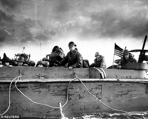 US Army troops and crewmen aboard a Coast Guard manned LCVP approach a beach on D-Day. After the initial landing soldiers found the original plan was in tatters, with so many units mis-landed, disorganized and scattered. Most commanders had fallen or were absent, and there were few ways to communicate