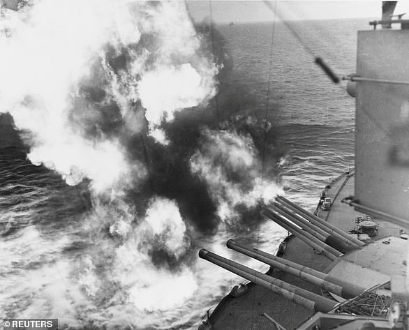 Forward 14/45 guns of the US Navy battleship USS Nevada fire on positions ashore during the D-Day landings on Utah Beach. The only artillery support for the troops making these tentative advances was from the navy. Finding targets difficult to spot, and in fear of hitting their own troops, the big guns of the battleships and cruisers concentrated fire on the flanks of the beaches