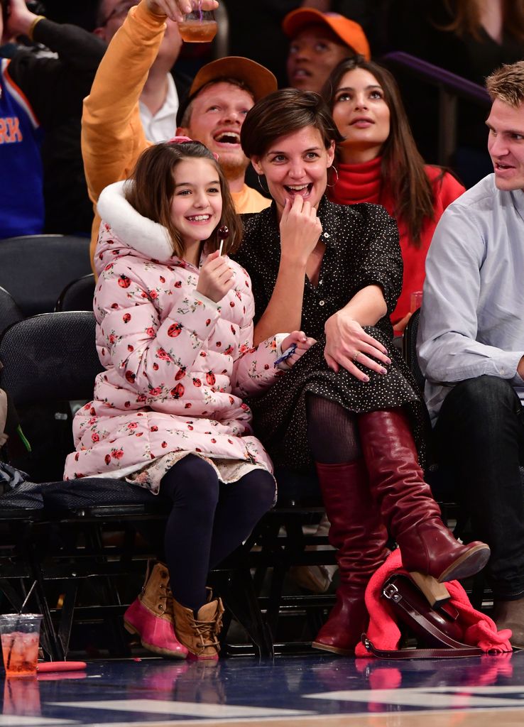 Suri Cruise and Katie Holmes attend the Oklahoma City Thunder vs. New York Knicks game at Madison Square Garden on December 16, 2017 in New York City.