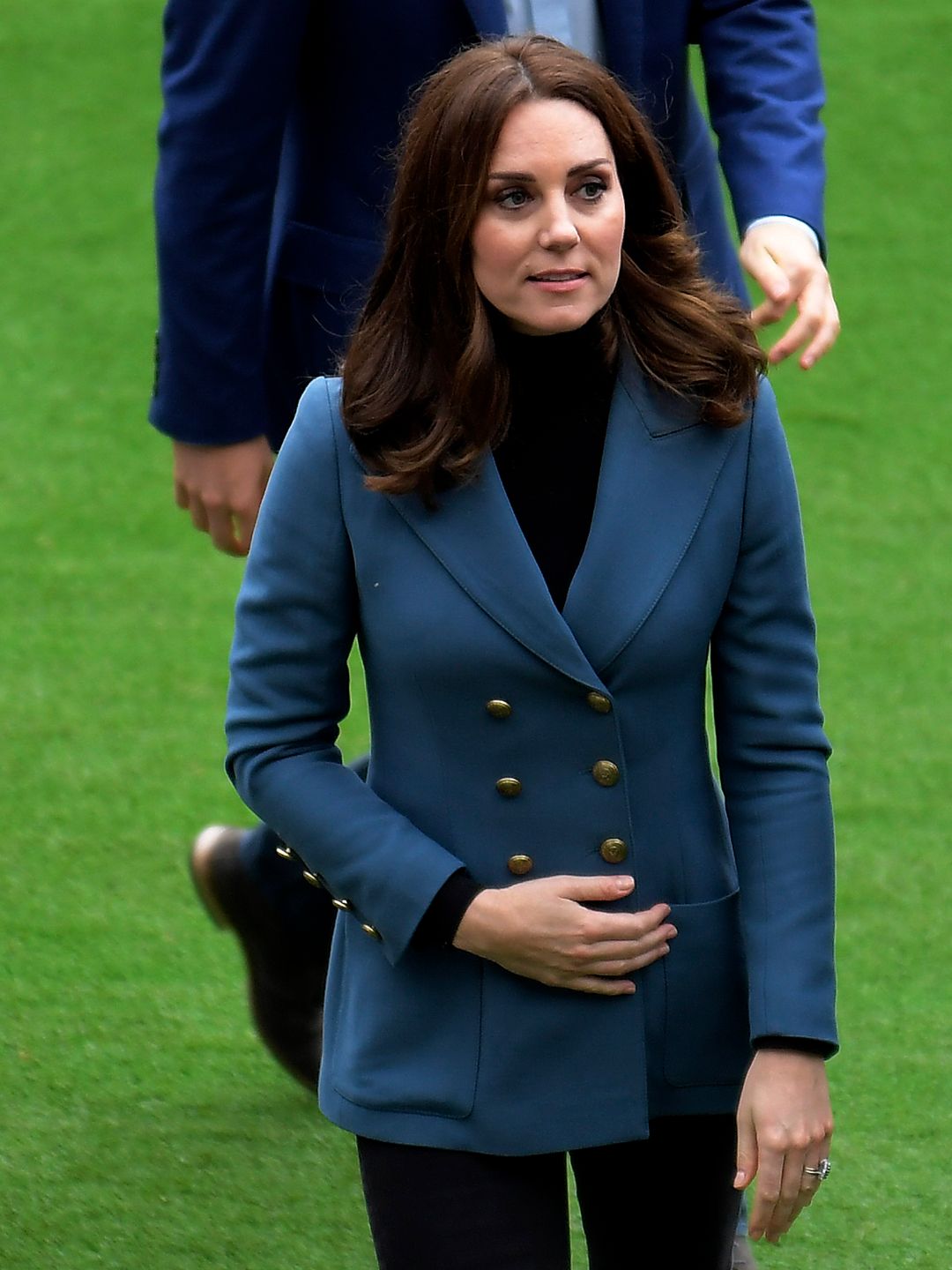 Princess Kate walking on the football field