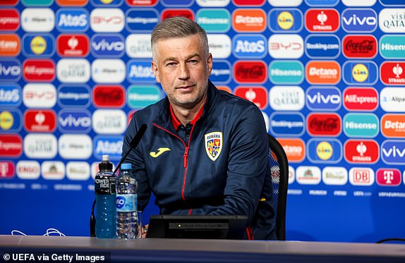 MUNICH, GERMANY - JUNE 16: Romania Head Coach Edward Iordanescu speaks during a press conference ahead of the group stage match against Ukraine at Munich Football Arena on June 16, 2024 in Munich, Germany. (Photo: Jasmin Walter - UEFA/UEFA via Getty Images)