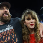 Watch Travis Kelce join Taylor Swift for surprise onstage appearance during Eras Tour show