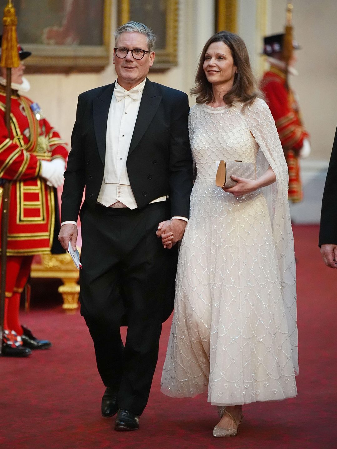 Keir Starmer and his wife Victoria walking around Buckingham Palace