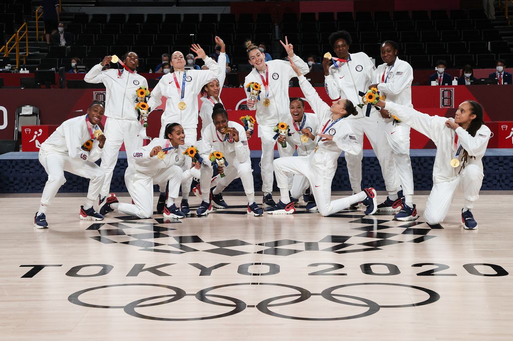 Team United States poses for photos with their gold medals during the Women's Basketball Medal Ceremony on Day 16 of the 2020 Tokyo Olympic Games at Saitama Super Arena on August 08, 2021 in Saitama, Japan.