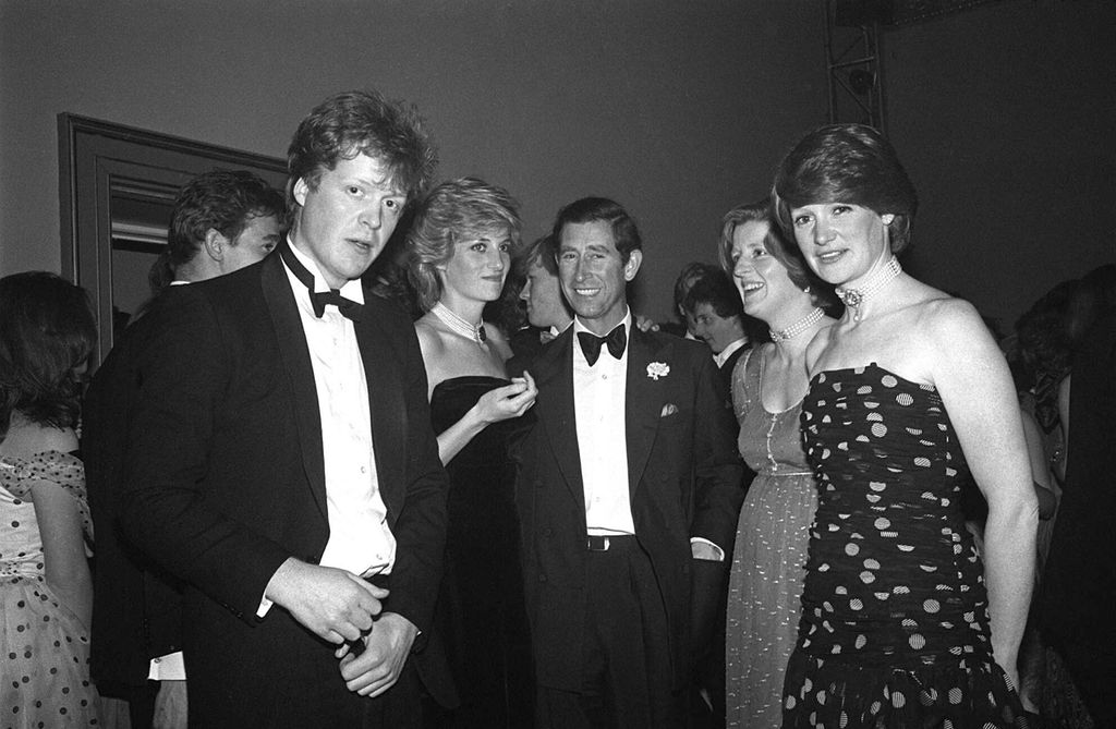 Black and white photo of Charles Spencer, Princess Diana, King Charles, Lady Jane Fellowes and Lady Sarah McCorquodale