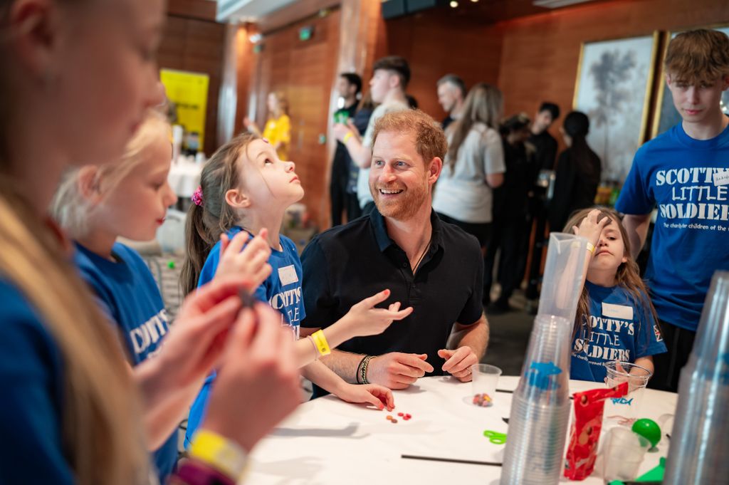 Prince Harry meets children at Scotties Little Soldiers event