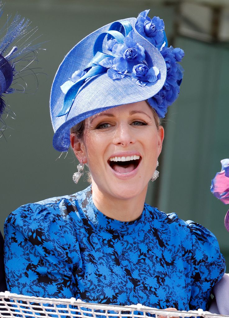 Zara Tindall smiling in blue in 2022