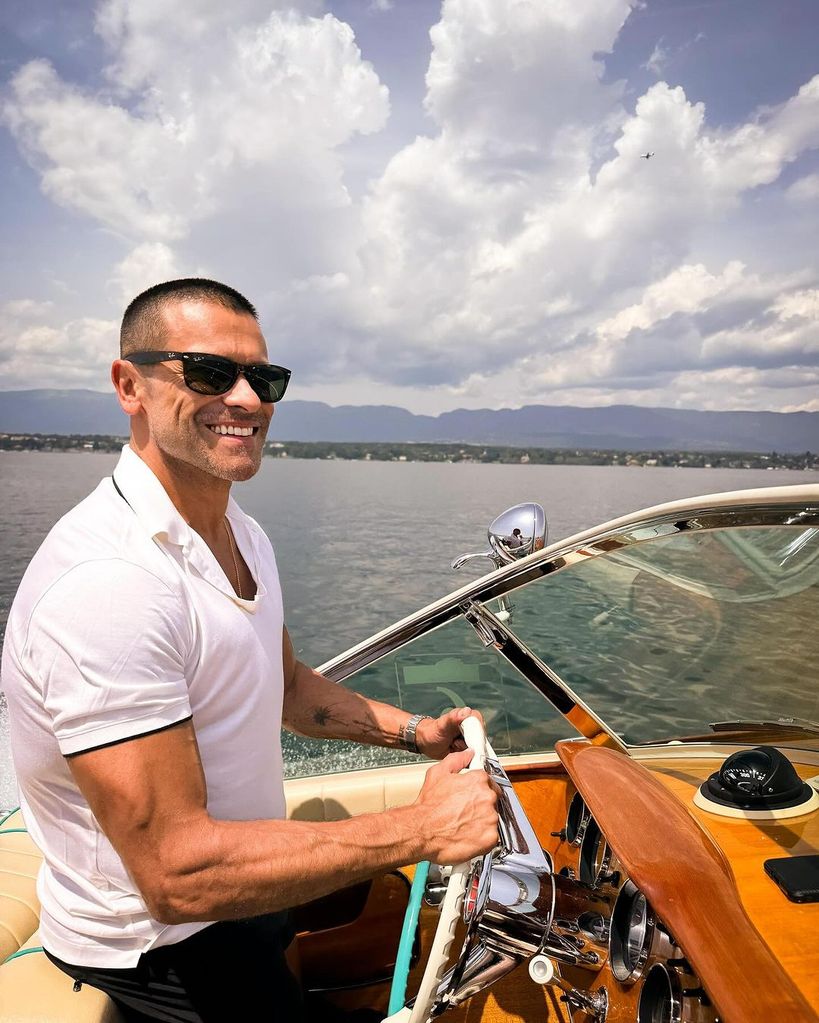 Mark Consuelos commands a private boat during a family trip to Switzerland