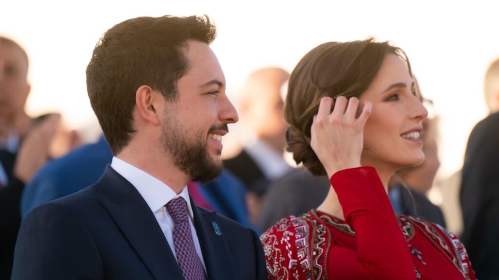 Princess Rajwa displays growing baby bump in stunning red gown at King Abdullah’s Silver Jubilee