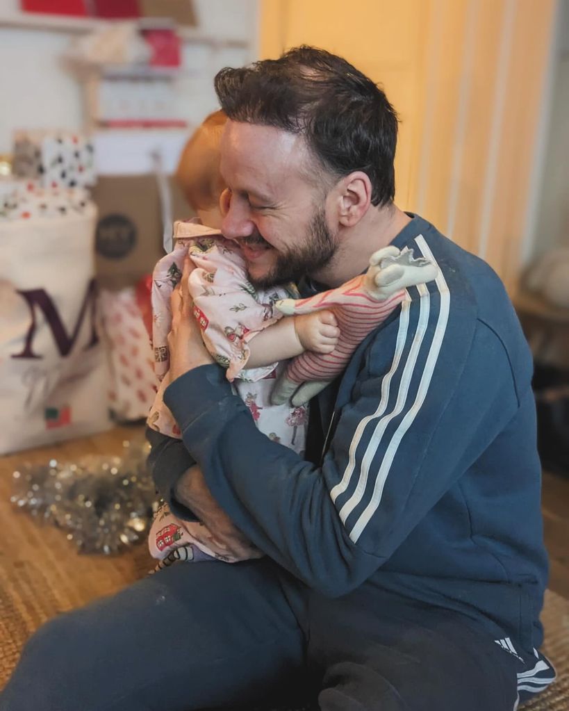 Kevin Clifton shared an adorable photo in which he is seen hugging his daughter during her first Christmas
