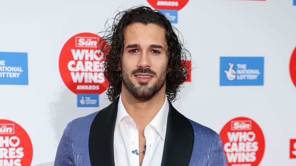 Graziano di Prima wearing a blue tux jacket 