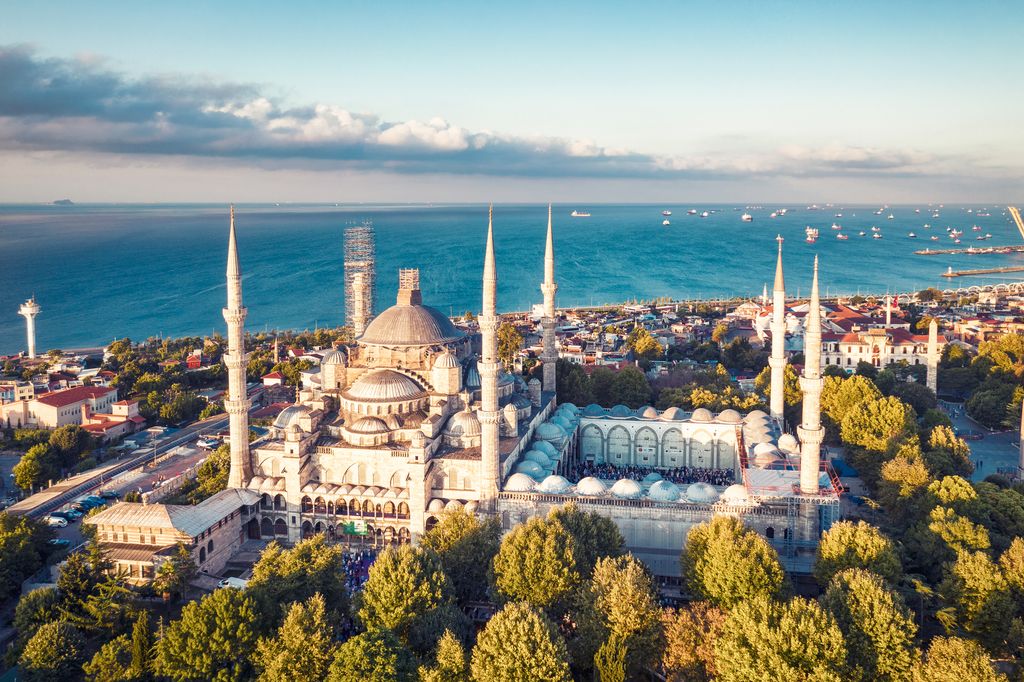 Photo of sunrise drone view of Sultan Ahmed Mosque and Istanbul city.