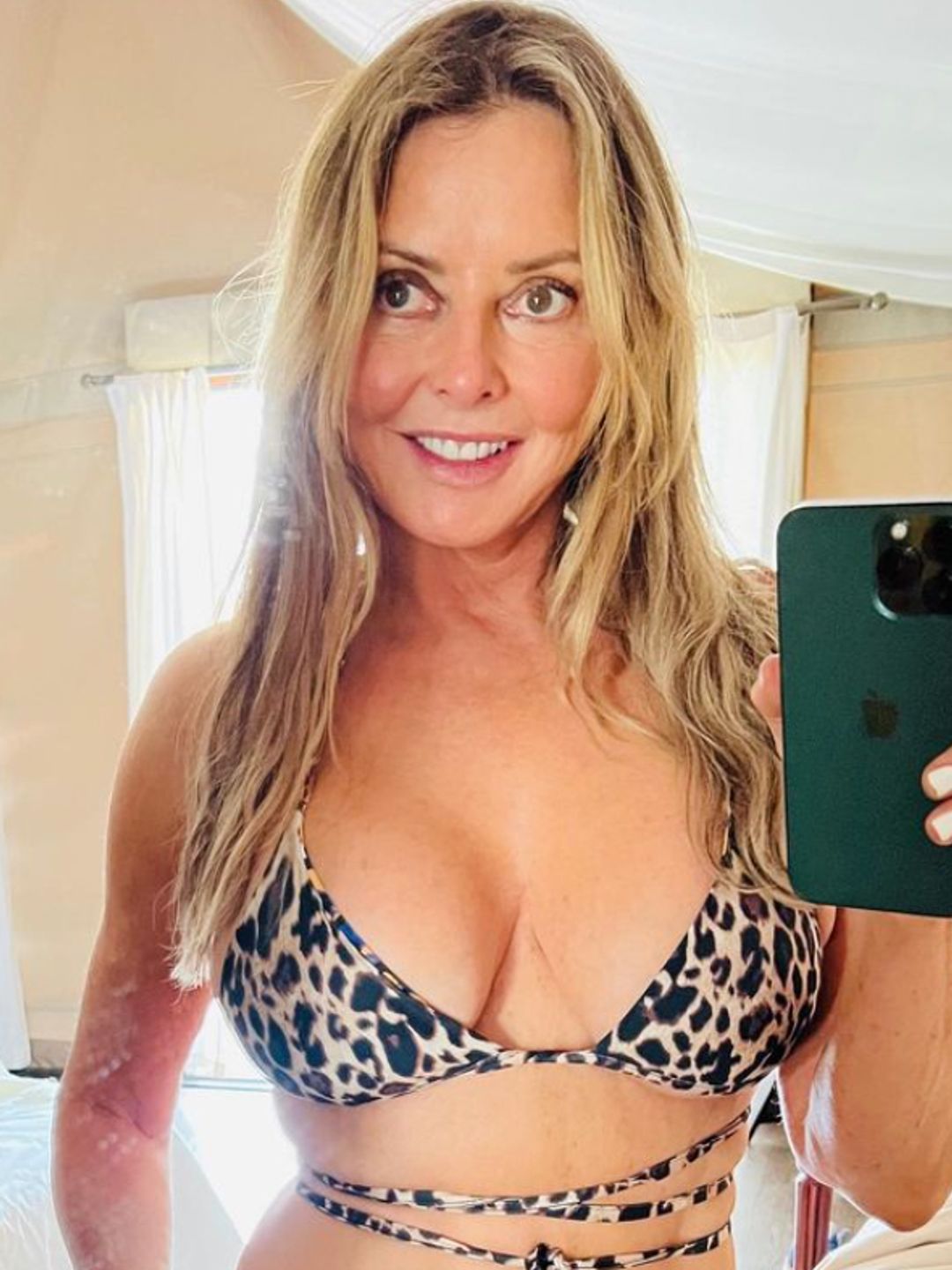 Carol Vorderman in a leopard print bikini
