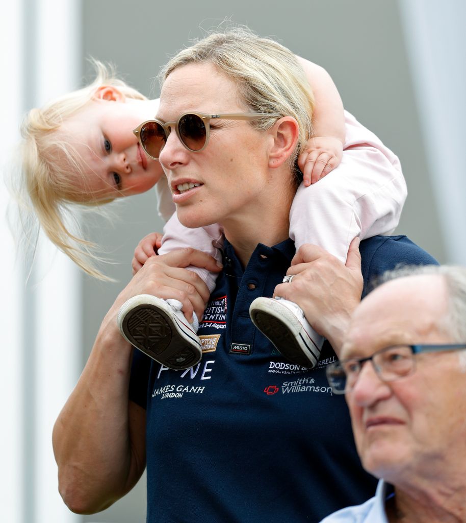 Zara Tindall carries daughter Lena Tindall on her shoulders 