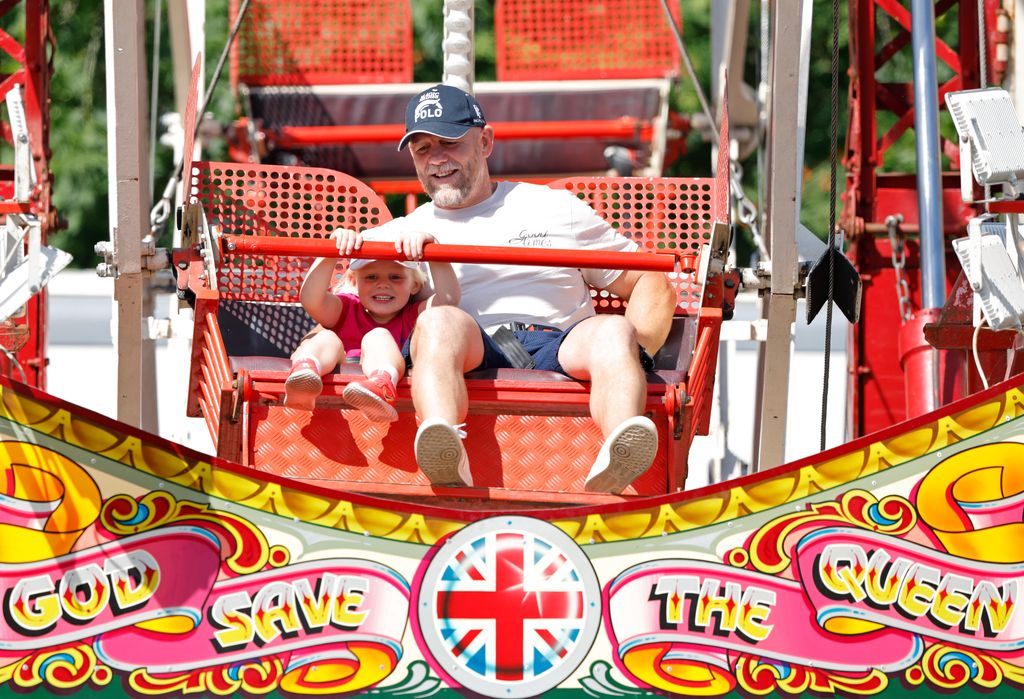     Lena Tindall and Mike Tindall riding on the Ferris wheel 