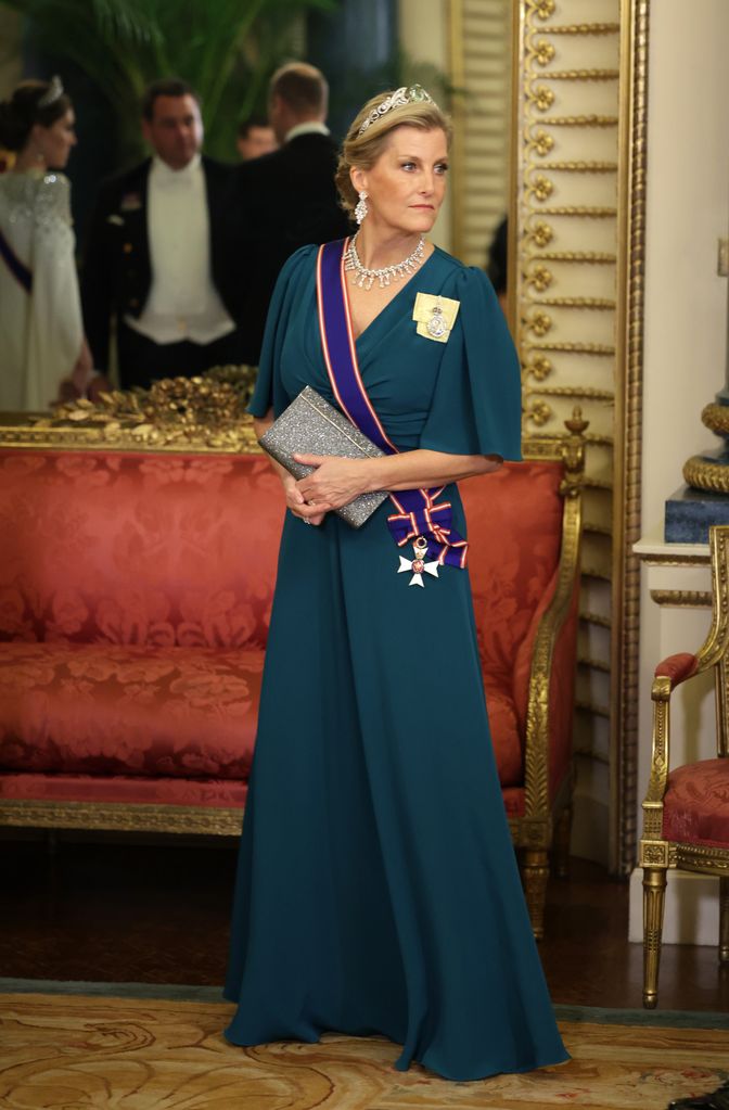 Sophie at Buckingham Palace in a petrol blue gown and tiara