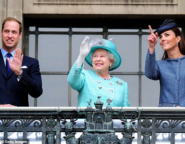 Kate with the Queen on the balcony of the Council House in Nottingham during the Queen's Diamond Jubilee tour of the UK on June 13, 2012.