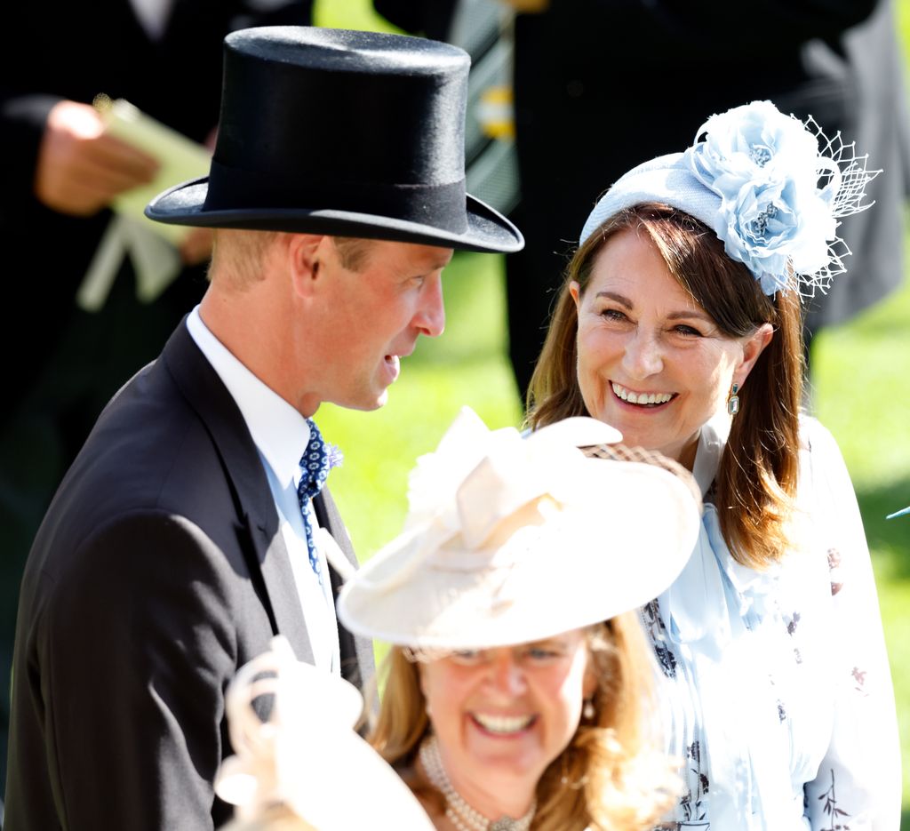 Carole Middleton smiles at Prince William
