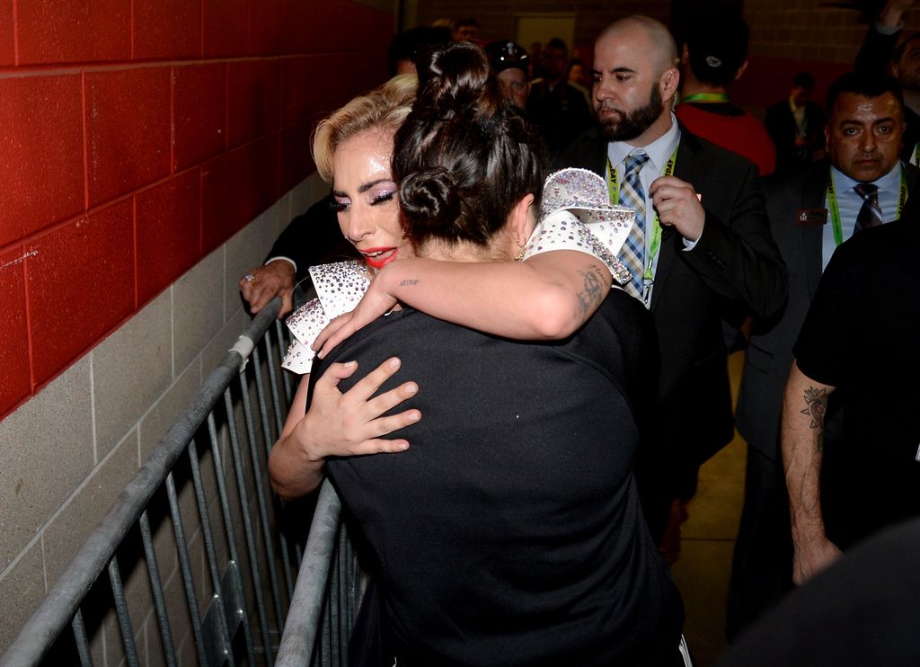 Lady Gaga hugs her sister Natali Germanotta backstage after the Pepsi Zero Sugar Super Bowl LI halftime show