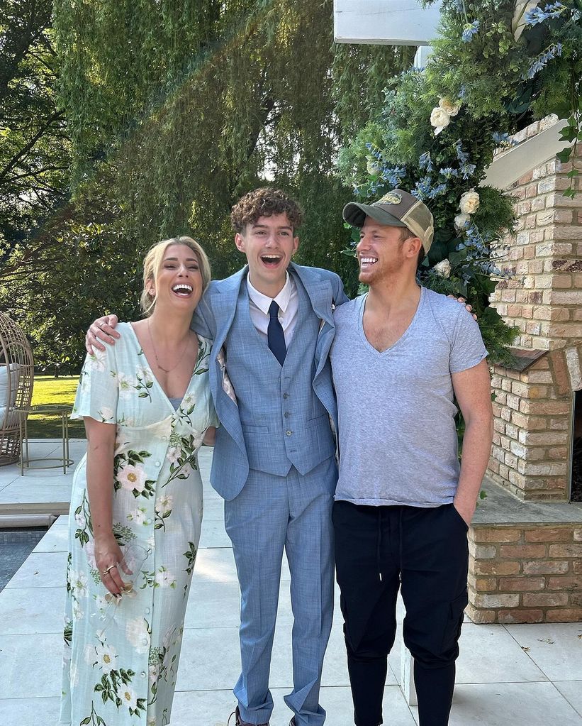 Joe Swash, Stacey Solomon and Zachary smiling outside