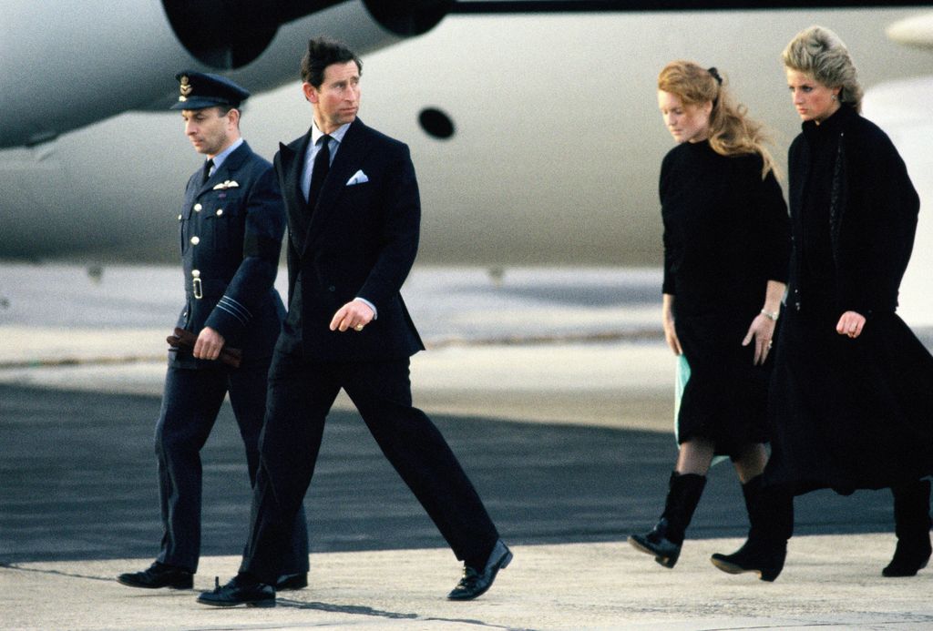 Prince Charles, Princess Diana and Sarah Ferguson, Duchess of York, return to England with the coffin of their friend Major Hugh Lindsay at RAF Northolt 