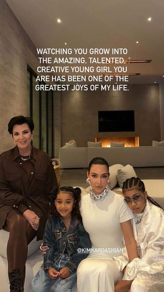     North West sits with her mother Kim Kardashian, sister Chicago and grandmother Kris Jenner