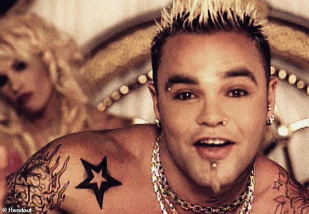 Crazy Town's Shifty Shellshock - who battled with substance abuse - died Monday at the age of 49 (Pictured in the video for 2000 hit Butterfly)