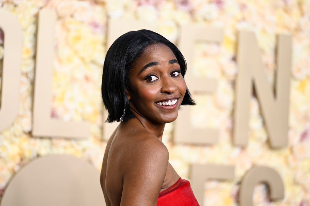 Ayo Edebiri smiles in a bob hairstyle at the Golden Globes 