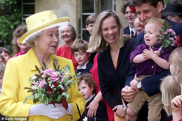 Two-year-old Frederik Azzopardi looked less than impressed to meet Her Majesty as she visited University College in Oxford in May 1999