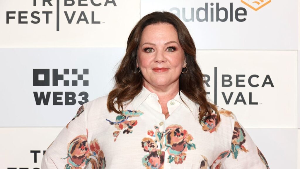 Melissa McCarthy turns heads in waist-cinching white flares and floral blouse at Tribeca Festival