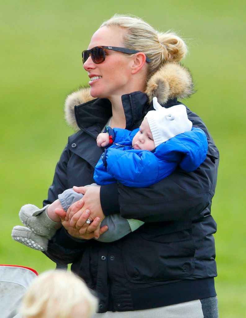 Zara Tindall holding a baby Mia Tindall