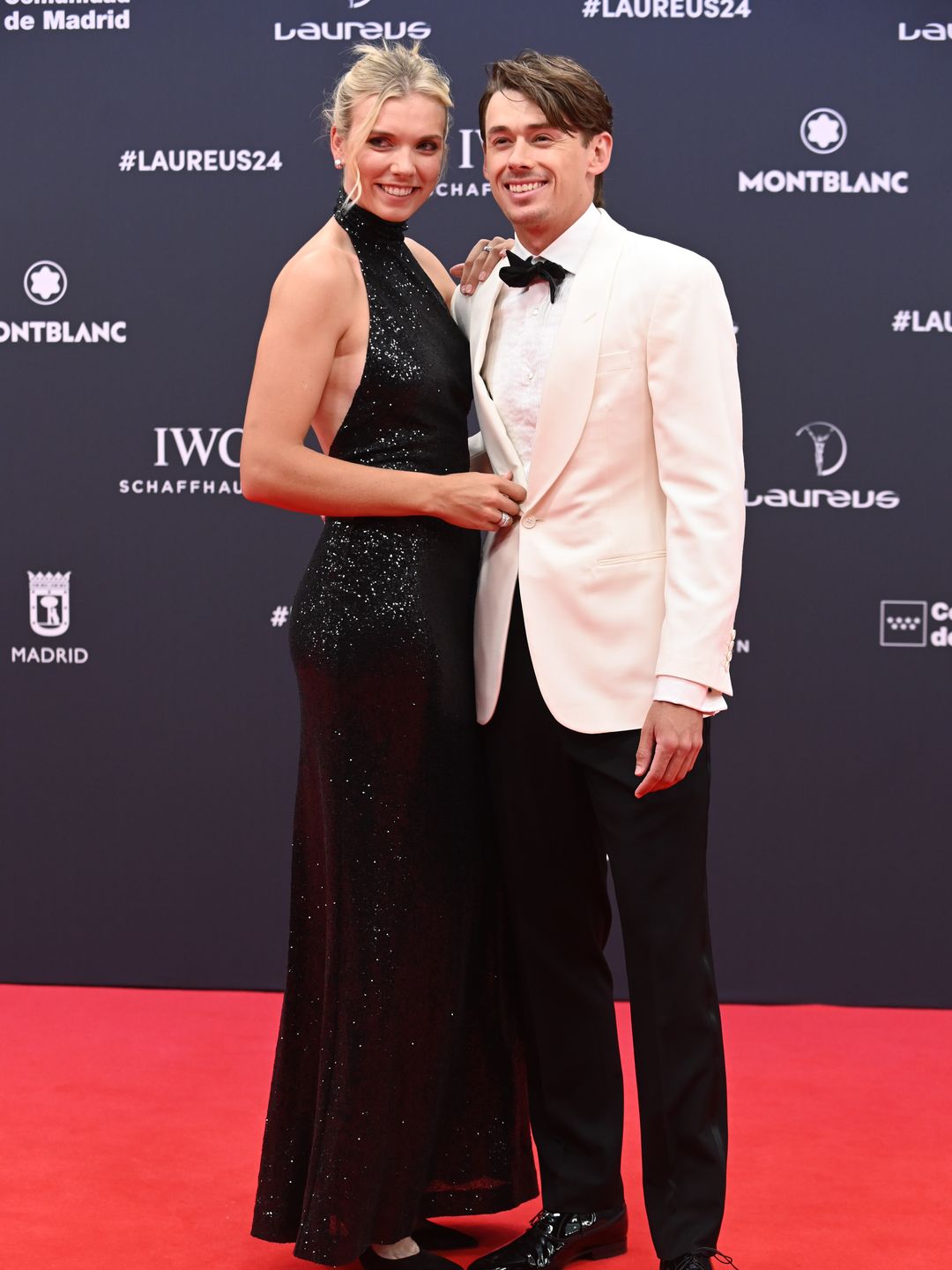 Katie Boulter and Alex de Minaur pose on the red carpet