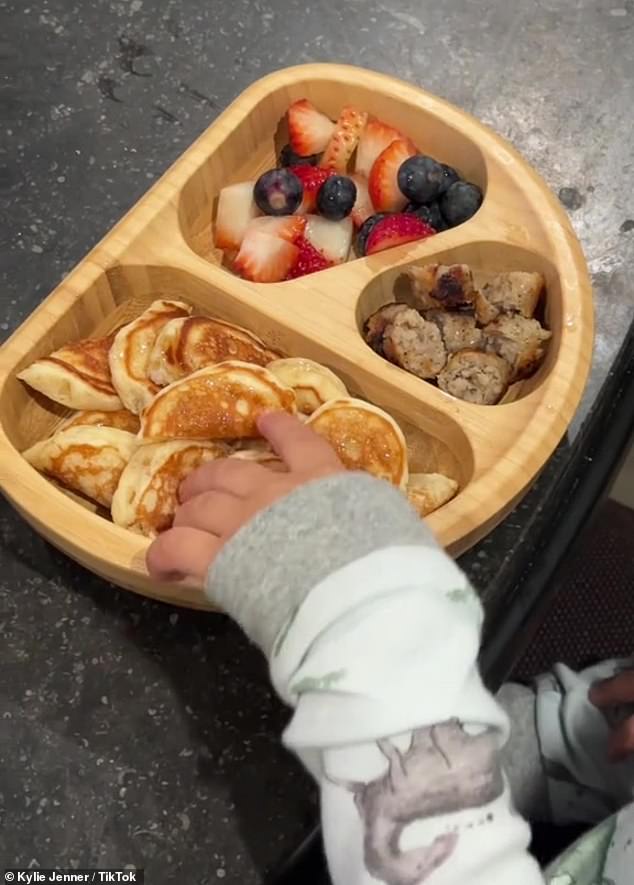 Kylie prepared a plate of breakfast for her son Ayer in March.
