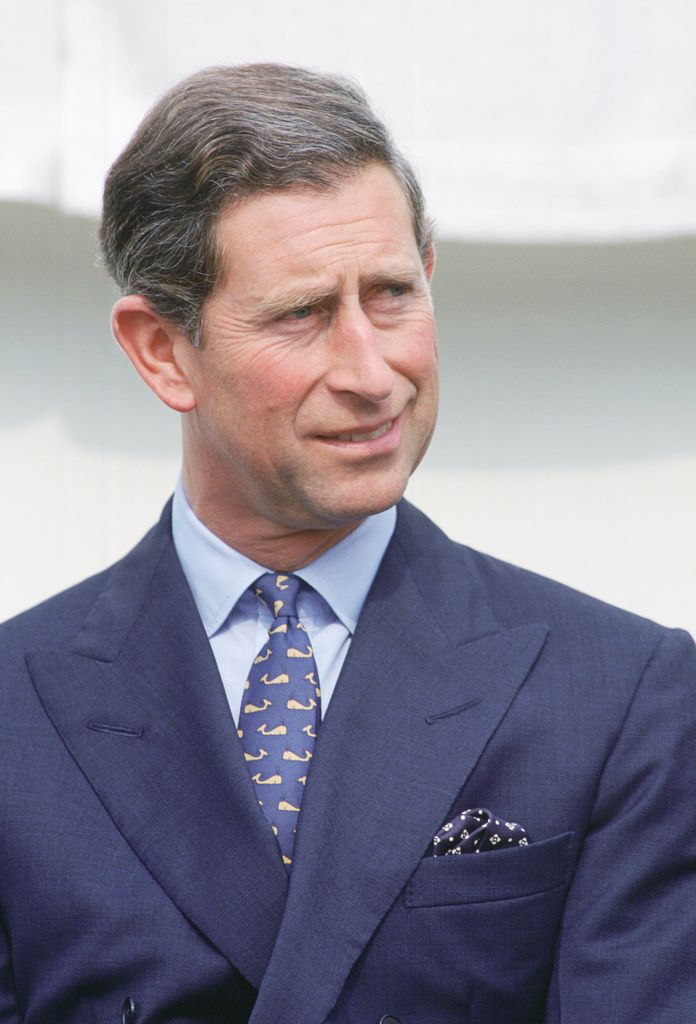 Prince Charles with a whale motif on his tie 