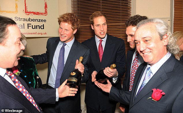 The brothers are presented with bottles of champagne at a reception marking the launch of the Henry van Straubenzee Memorial Fund in January 2008