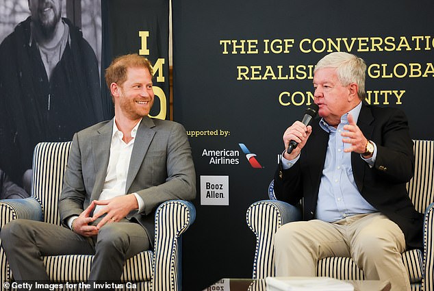 Harry speaking on stage with Sir Keith Mills to mark ten years since the inaugural Invictus Games at London 2014