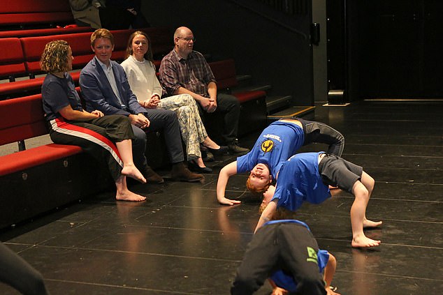 The Duke of Westminster and Olivia watch members of Cheshire Dance perform during a charity visit