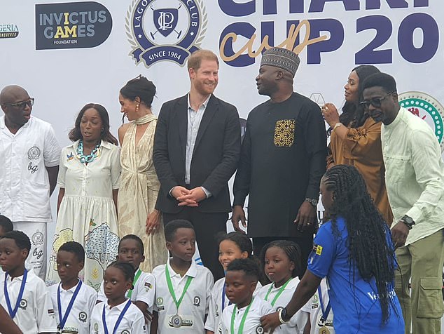 The Duke and Duchess of Sussex appeared to be enjoying their quasi-royal tour of the country as they met with officials.